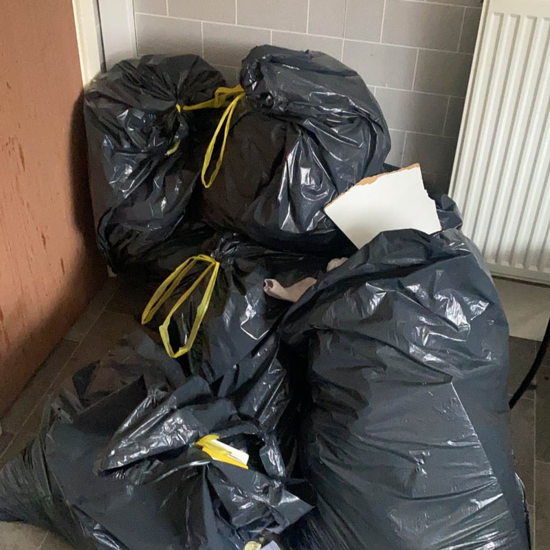 house waste in bin bags ready for the bin